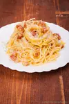 What's indeed to be considered an authentic Spaghetti alla Carbonara (kahr-boh-NAH-rah). An Italian pasta recipe from Roman cuisine...
